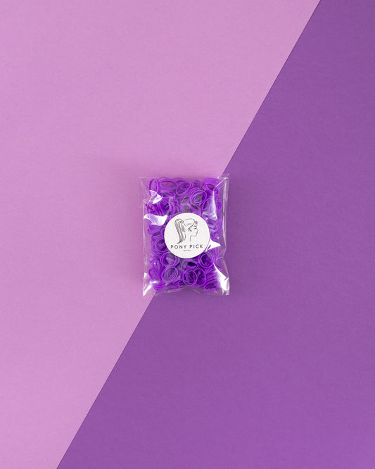 Colored Plastic Elastics: red, purple, white, pink