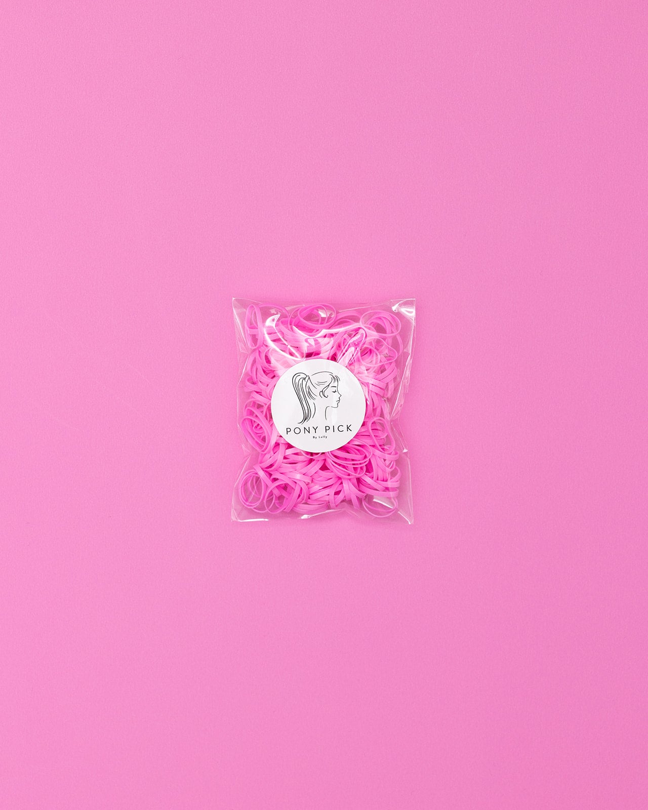 Colored Plastic Elastics: red, purple, white, pink